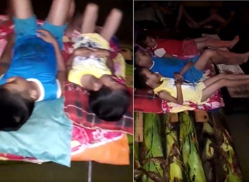 Hình ảnh ba đứa trẻ nằm trên bè chuối trong mưa lũ ở Quảng Trị khiến nhiều người xót xa.