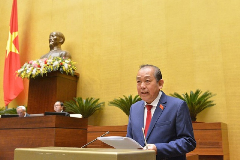 Phó Thủ tướng Trương Hoà Bình báo cáo trước Quốc hội. (Ảnh: Dân trí).