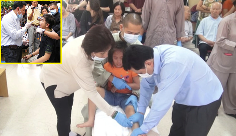 Ông Võ Hoàng Yên trong 1 lần chữa bệnh bại liệt cho trẻ nhỏ và chữa câm điếc được đăng trên mạng. (Ảnh cắt từ clip Youtube).