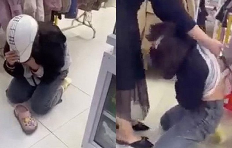 Hình ảnh nữ sinh bị chủ shop quần áo và mẹ chồng chủ shop đánh đập dã man chỉ vì đến xin lỗi vì lấy chiếc chân váy. (Ảnh: Cắt từ clip).