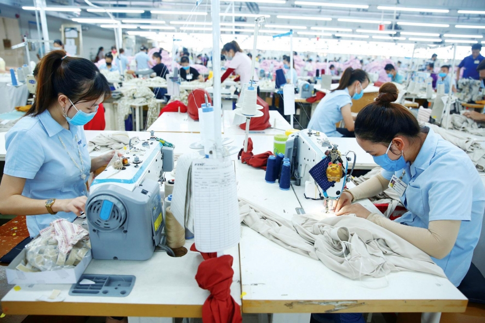 Lương tối thiểu vùng ở khu vực doanh nghiệp điều chỉnh 3 lần với tổng mức tăng là 17,7%. (Ảnh minh họa)