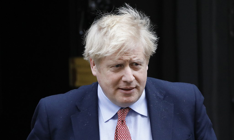 Thủ tướng Anh Boris Johnson bao nhiêu tuổi? Hình ảnh là lúc ông rời văn phòng làm việc tại số 10 Downing Street, London ngày 18/3.