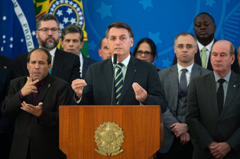 Tổng thống Brazil Jair Bolsonaro từng gọi bệnh Covid-19 là cảm lạnh. Ảnh: Getty Images.