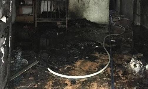 Vụ cháy nhà khiến 2 vợ chồng tử vong.