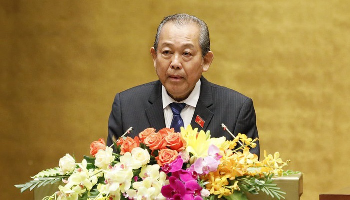 Phó thủ tướng Trương Hoà Bình trình bày báo cáo của Chính phủ - Ảnh: Quang Phúc.    