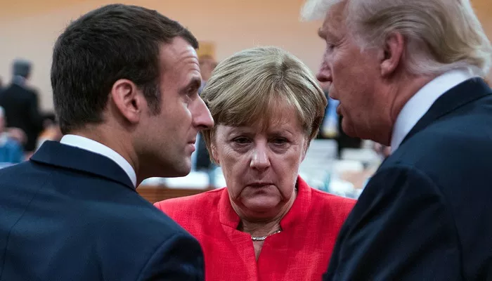 Từ trái qua: Tổng thống Pháp Emmanuel Macron, Thủ tướng Đức Angela Merkel, và Tổng thống Mỹ Donald Trump - Ảnh: Getty/Politico.    