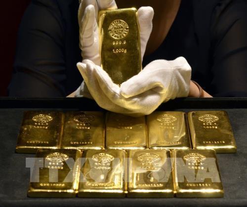 Giá vàng châu Á giảm do đồng USD mạnh lên. Ảnh: TTXVN  