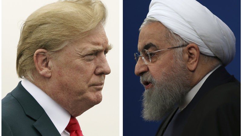 Tổng thống Mỹ Donald Trump và Tổng thống Iran Hassan Rouhani. Ảnh: NPR.  