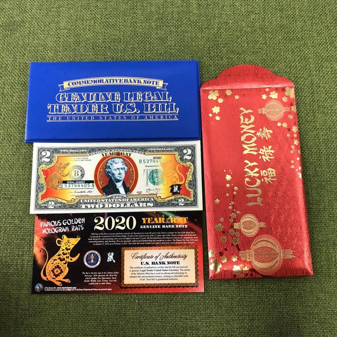 Tiền 2 USD hình chuột mạ vàng được quảng cáo do Bộ Tài chính Mỹ in ấn có giá 300.000 đồng/tờ