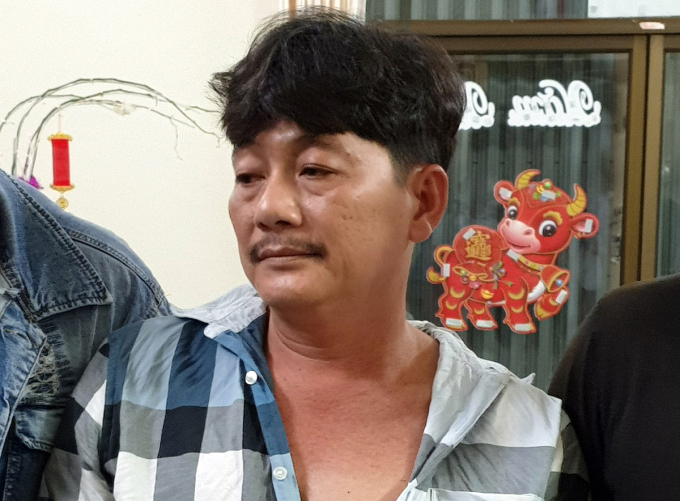 Trần Công Xuân khi bị bắt tại nhà ở quận Thốt Nốt, cuối tháng 3. Ảnh: Công an cung cấp