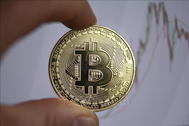 Đồng tiền kỹ thuật số Bitcoin. Ảnh: AFP/TTXVN