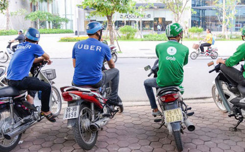 Theo TS Trần Đình Thiên, cử nhân chạy Uber, Grab là thảm họa. (ảnh minh họa).   Ảnh: T.L