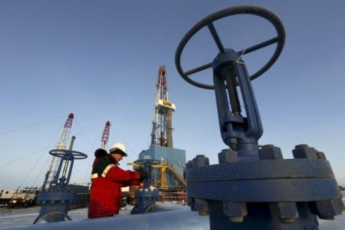 Giá dầu thế giới đi lên theo Phố Wall. Ảnh: Reuters