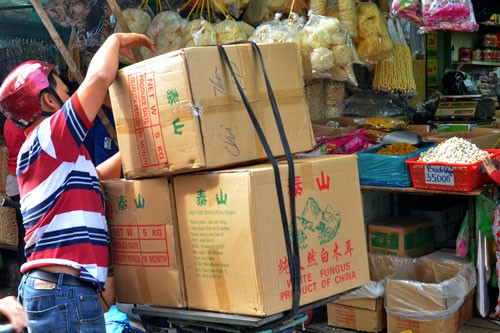 Bộ Công Thương cảnh báo việc bị chặn đường xuất khẩu sang Mỹ có thể dẫn tới nguy cơ hàng Trung Quốc tràn vào Việt Nam Ảnh: TẤN THẠNH