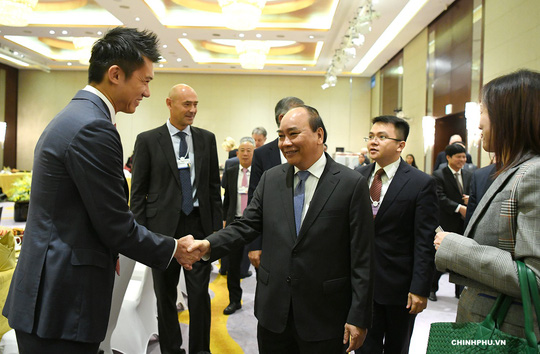 Thủ tướng Nguyễn Xuân Phúc cùng các đại biểu. Ảnh: Quang Hiếu