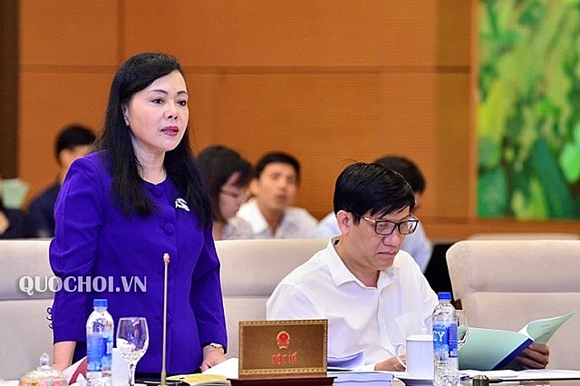 Bộ trưởng Nguyễn Thị Kim Tiến trình bày Tờ trình Dự luật. Ảnh: Quochoi.vn