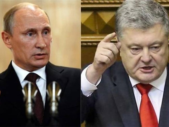 Căng thẳng Nga-Ukraine đang có nguy cơ dẫn đến chiến tranh. Trong ảnh: Tổng thống Nga Vladimir Putin (trái) và Tổng thống Ukraine Petro Poroshenko. Ảnh: AFP    