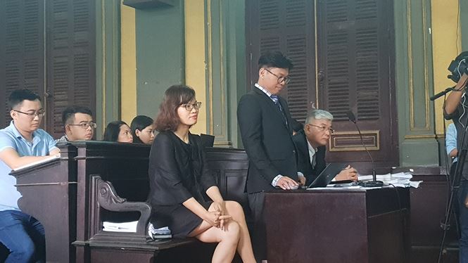 Đại diện Grab tại phiên tòa sáng 26/12. Ảnh Văn Minh