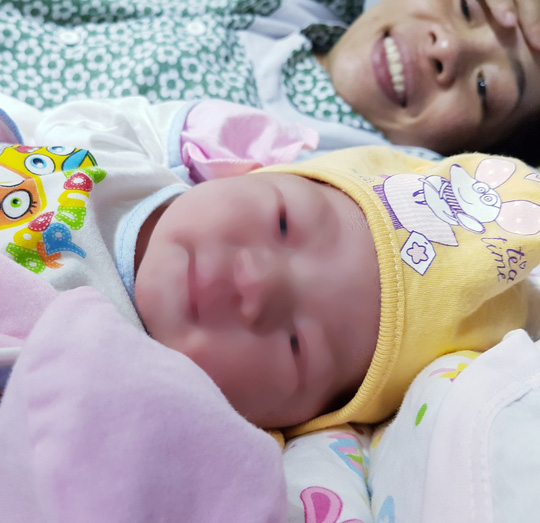 Cháu bé khỏe mạnh sau khi sinh - Ảnh: Hoàng Minh
