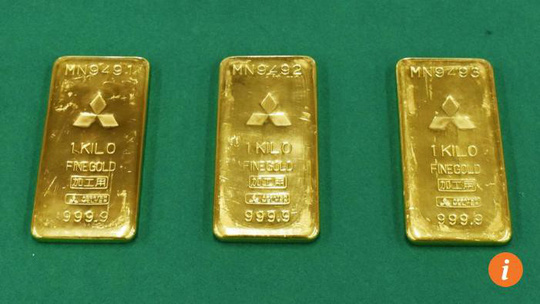 Số vàng bị thu giữ hồi tháng 7-2014. Ảnh: KYODO