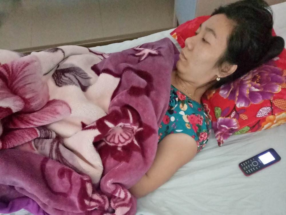 Chị Tưởng vẫn đang trong tình trạng nguy kịch - nằm tại bệnh viện (ảnh gia đình cung cấp)