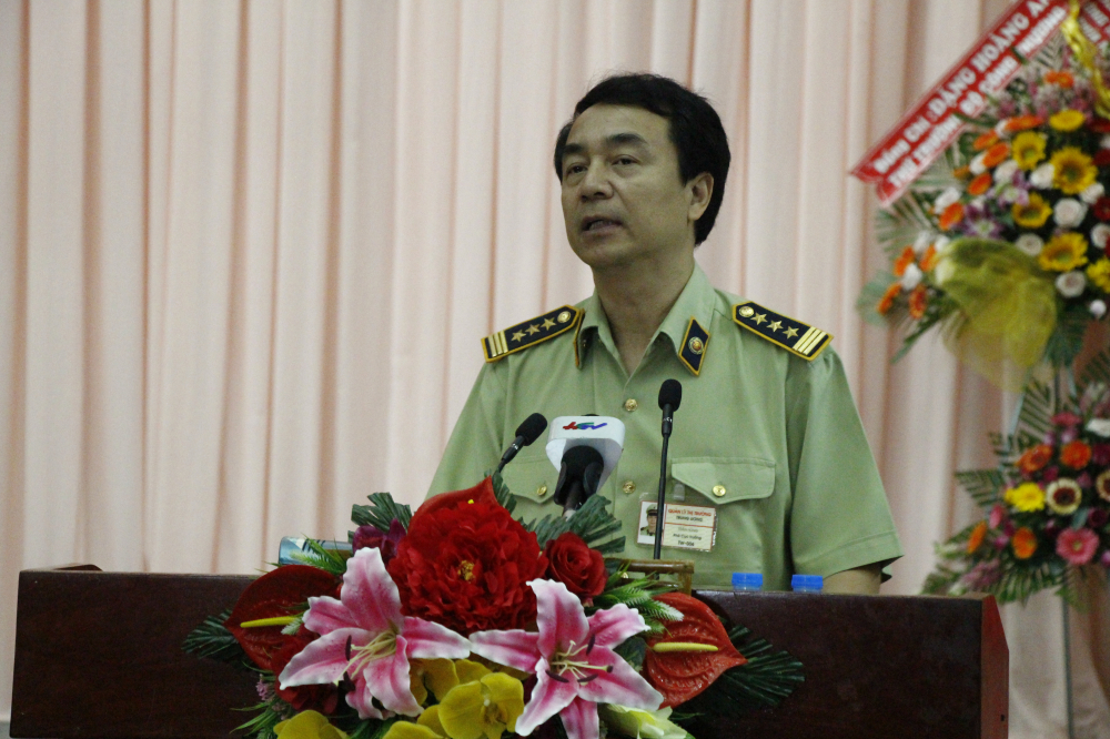 Đồng chí Trần Hùng, Phó cục trưởng Cục Quản lý thị trường phát biểu tại hội nghị