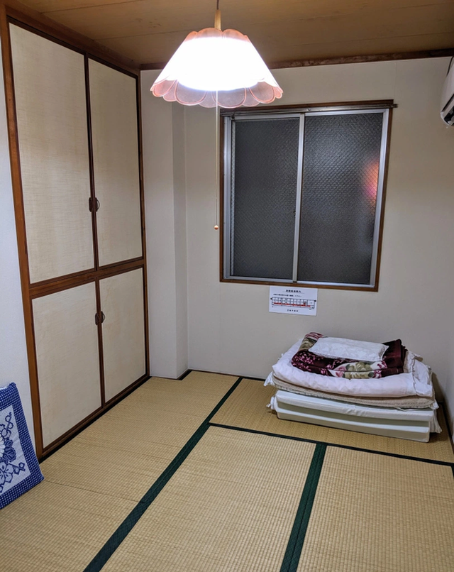 Một căn phòng bên trong khách sạn Business Ryokan Asahi 
