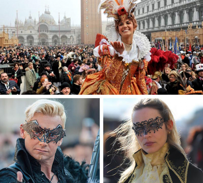 Du khách mặc trang phục của các lãnh chúa và quý bà thời thế kỷ 18, đeo mặt nạ Venice tới Venice Carnival 2022 từ ngày 12/2. (Ảnh: Xinhua)