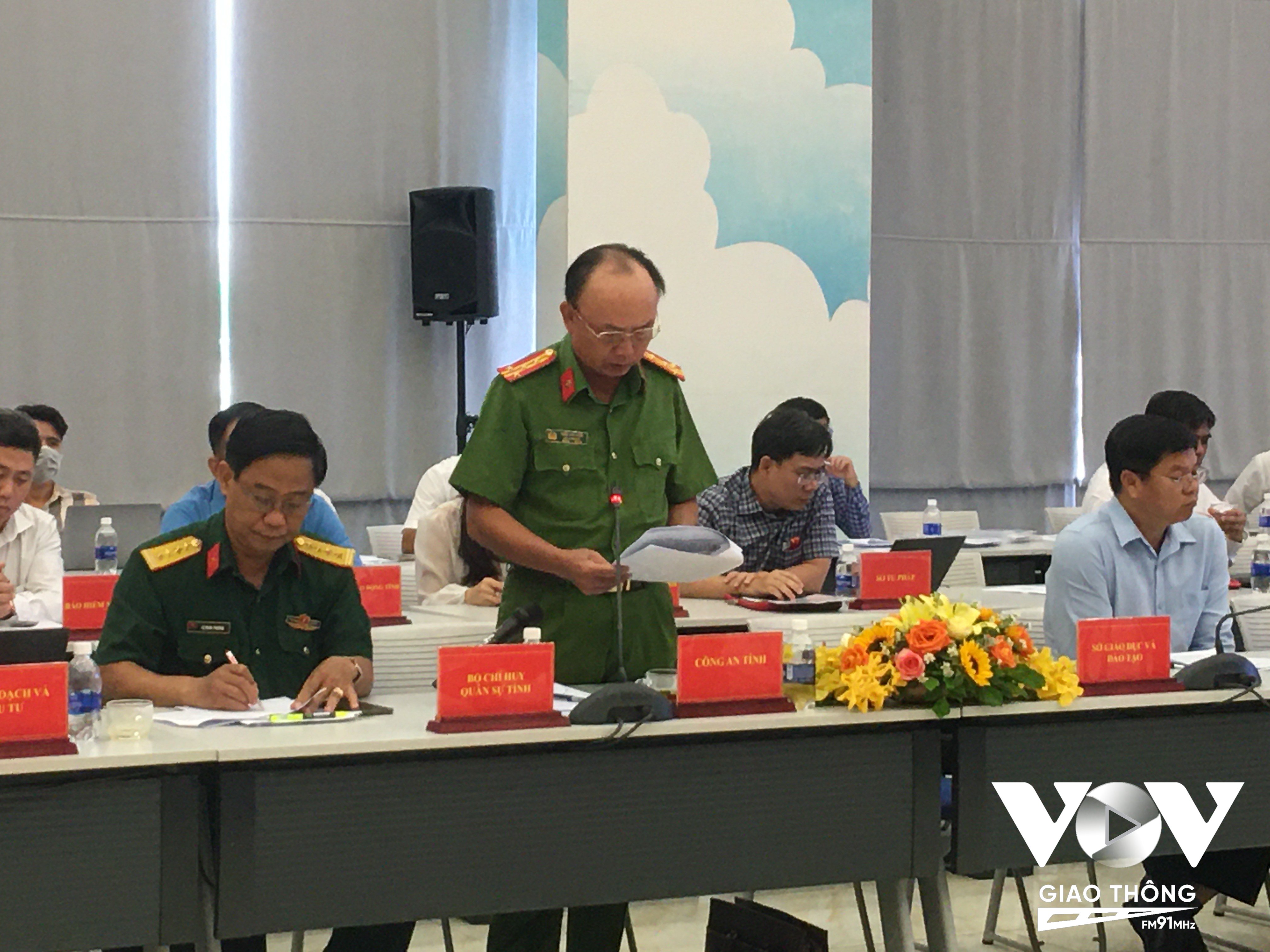 Đại tá Trần Văn Chính thông tin tại cuộc họp báo