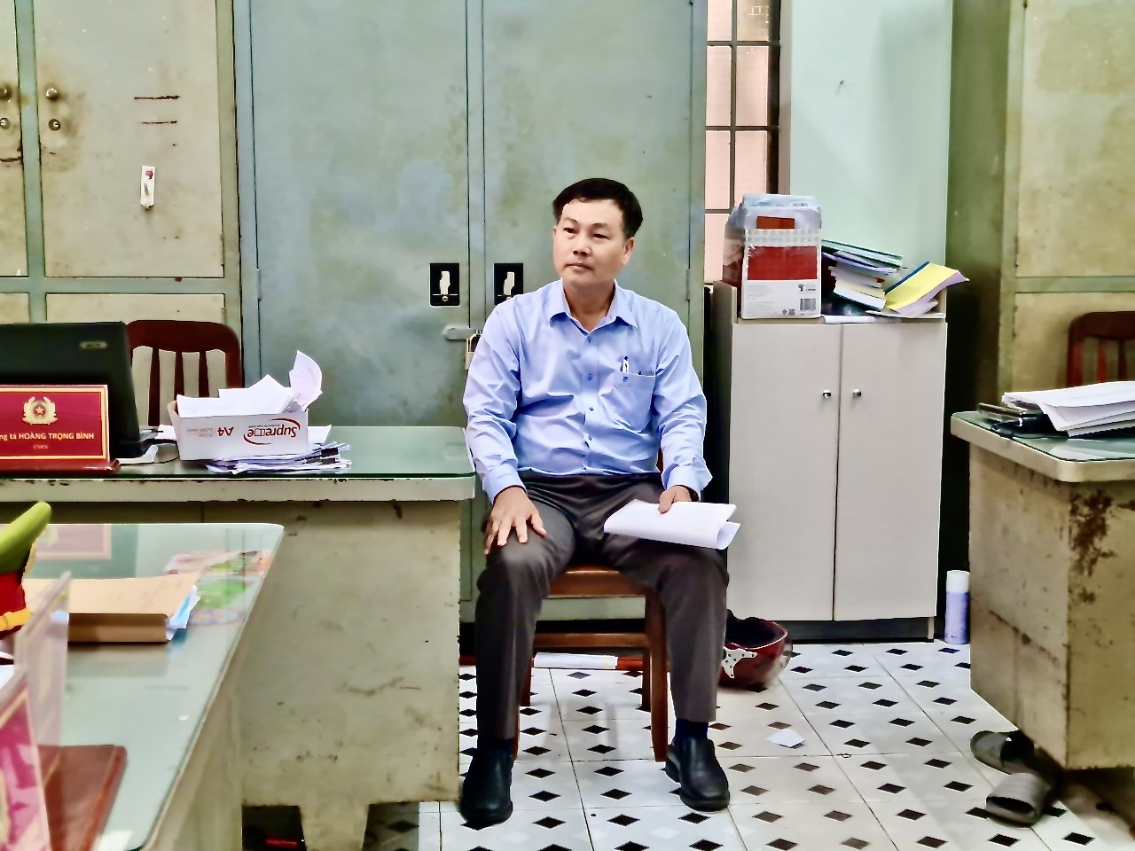 Ông Nguyễn Văn Hồng - Tổng Giám đốc Công ty Cổ phần Tín Nghĩa tại cơ quan công an