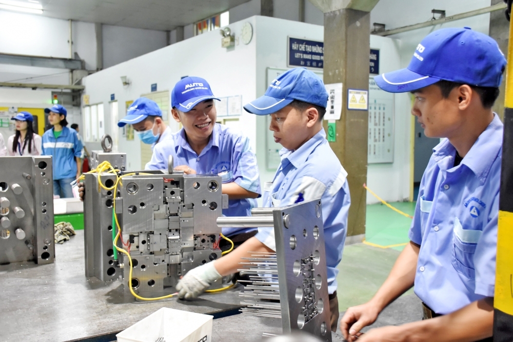 Không khí thi đua lao động sản xuất tại Công ty TNHH Cao su Inoue Việt Nam những ngày đầu năm 2023. Ảnh: Lao động thủ đô