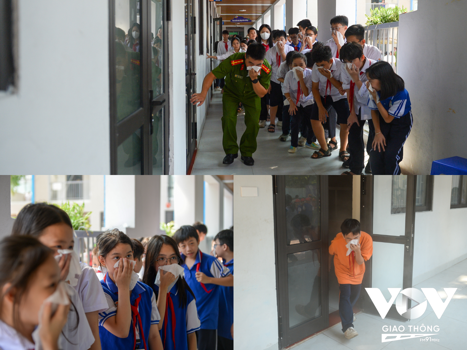 Cán bộ Đội Cảnh sát PCC&CNCH quận Ba Đình hướng dẫn các em học sinh thoát nạn trong môi trường khói, khí độc.