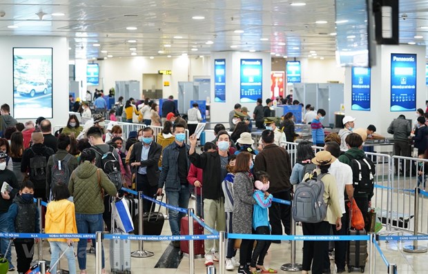 Hành khách đã bắt đầu quay trở lại chọn hàng không làm phương tiện đi lại sau khi kiểm soát tốt dịch bệnh COVID-19. (Ảnh: Phan Công/Vietnam+)