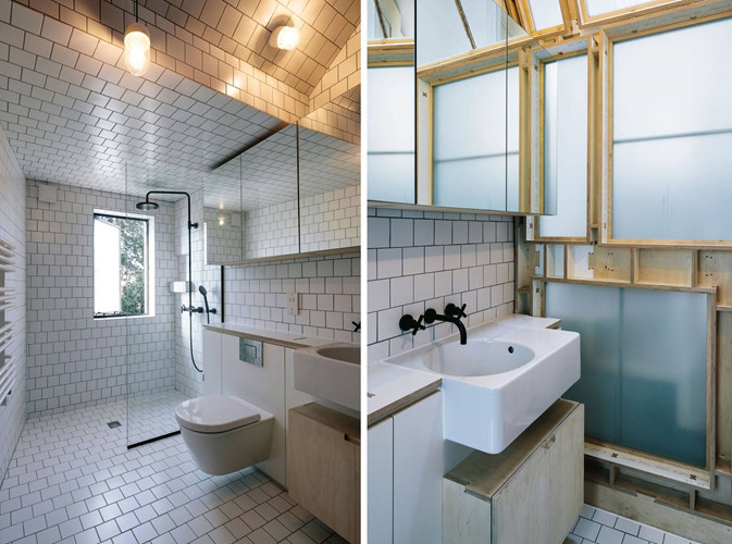 Phòng tắm đơn giản với gạch trần và gam màu trắng chủ đạo. Nguồn ảnh: Yellowtrace.