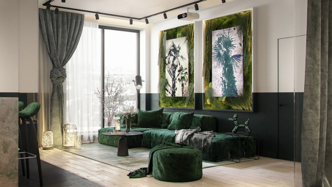 Ghế sofa bọc vải màu xanh, tạo nên sự cuốn hút cho phòng khách.
