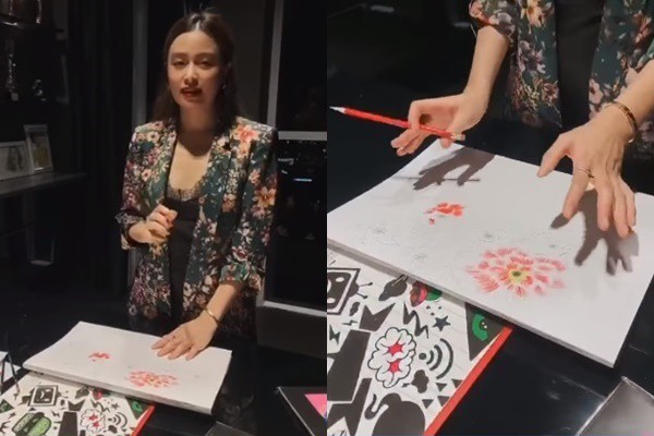 Hoàng Thùy Linh tranh thủ tập vẽ khi ở nhà. Nguồn ảnh: cắt từ video.