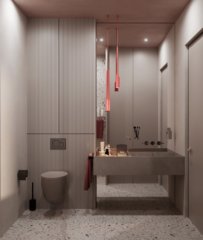 Phòng tắm trong căn hộ trang trí theo phong cách hiện đại, cộng thêm một vài điểm nhấn màu hồng trên đèn và khăn./.