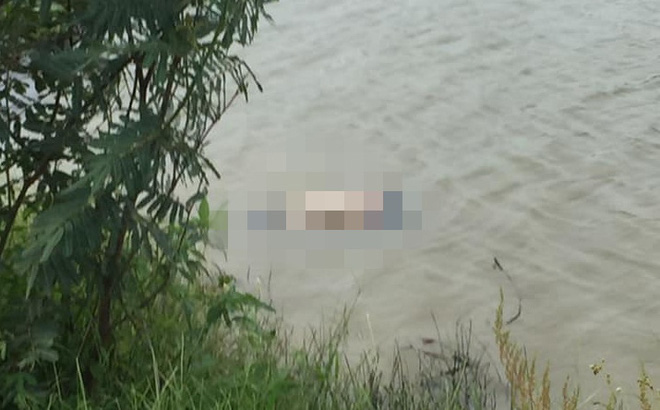 Hiện trường nơi phát hiện thi thể 3 mẹ con trên sông ớ Bắc Giang. Ảnh: Công Lý