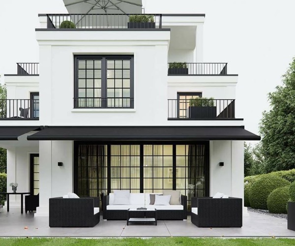 Nhà 2 tầng hiện đại với sơn ngoại thất trắng đen, kết hợp thêm tầng mái tum ngắm sao đêm và cà phê hóng gió