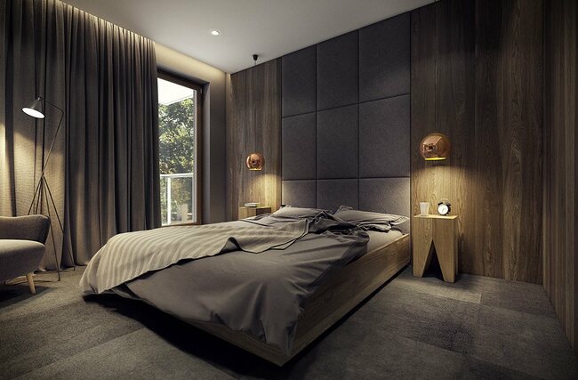Trong phòng ngủ, các tấm gỗ dày cùng các bức rèm tưởng vẫn duy trì tông màu chủ đạo của ngôi nhà nhưng với màu sác tối hơn.