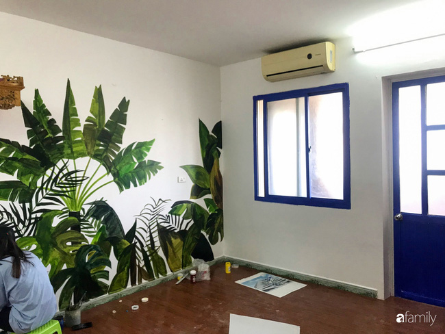  Góc nhỏ trên tường đẹp mắt với hình vẽ cây xanh nhiệt đới.