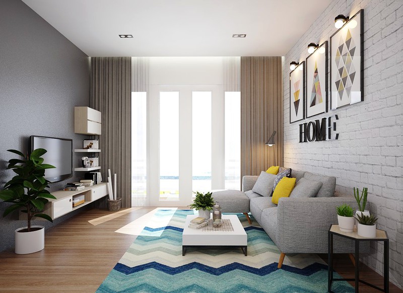  Gam màu trắng bao phủ phần lớn diện tích, sàn gỗ và trần thạch cao cũng giúp cho không gian bên trong căn hộ thoáng đãng hơn nhiều.