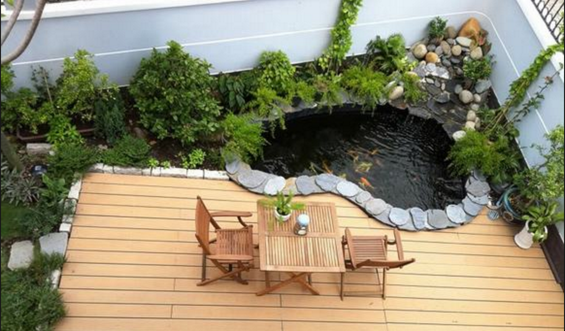 Một góc sân là đủ tạo nên hồ cá đẹp mắt.