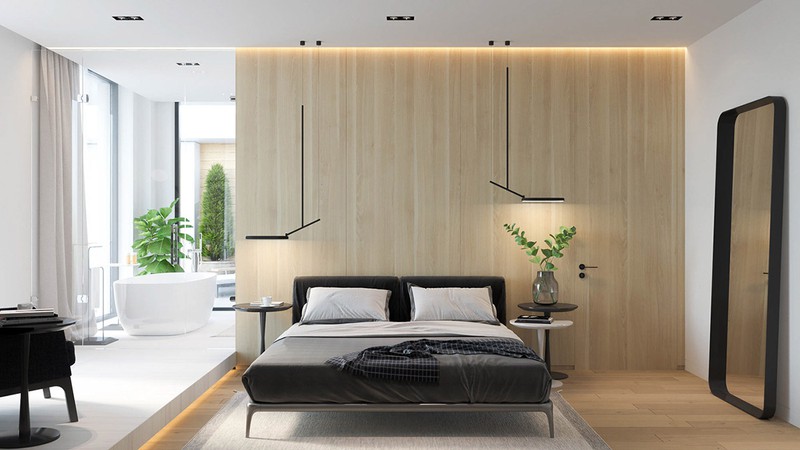 Bức tường bằng gỗ đặt đầu giường tạo sự liền mạch trong thiết kế.