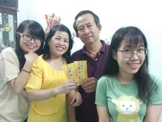  Gia đình hạnh phúc với hai con gái của chị Trần Thị Lan Thanh.