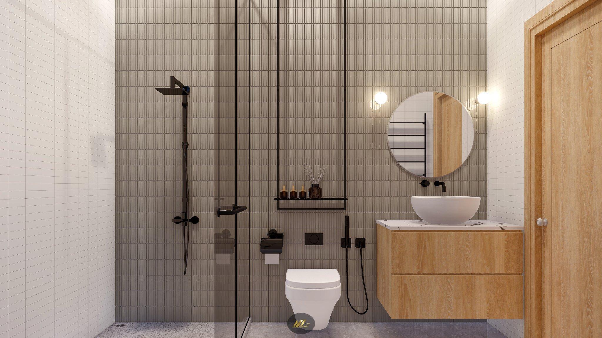  Phòng vệ sinh tầng 1 đơn giản, tiện nghi, dùng vách kính tắm đứng thay bồn vì diện tích hẹp. 