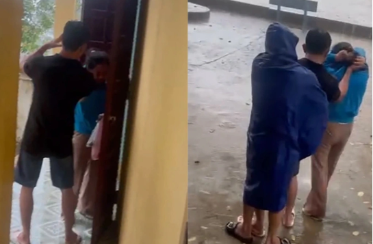 Người đàn ông túm tóc, bắt cô giáo đứng giữa trời mưa - Ảnh: Báo Dân trí